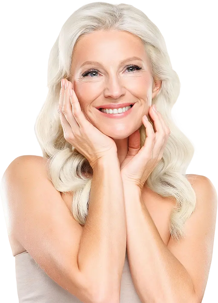woman smiling, holding hands to face