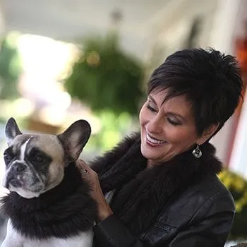 Woman smiling at dog