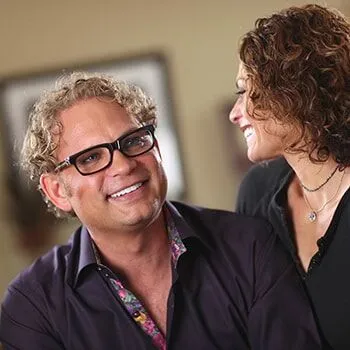 Man and woman smiling