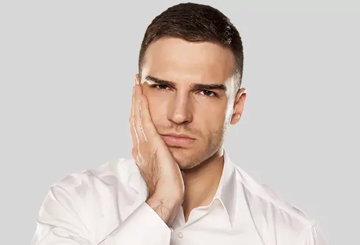 Man holding jaw