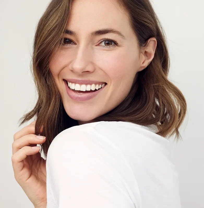 smiling woman with brown hair