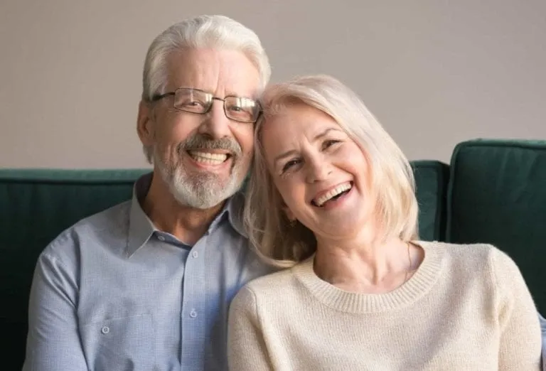 Laughing senior couple