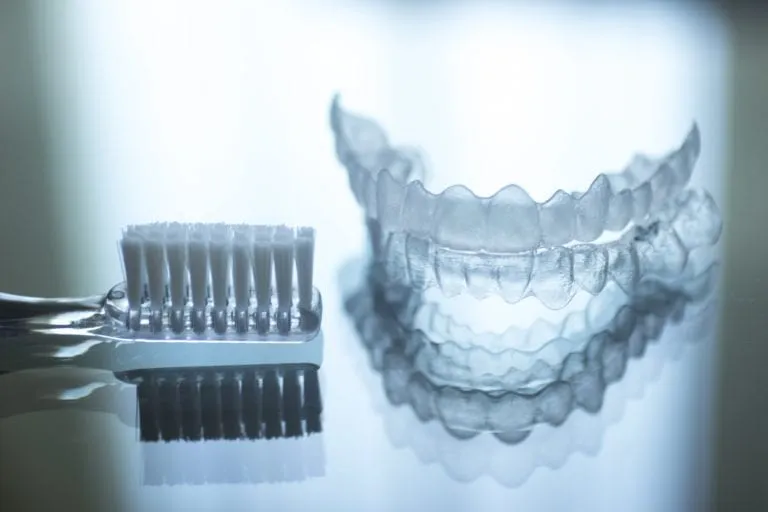 Clear aligner tray on a dental model