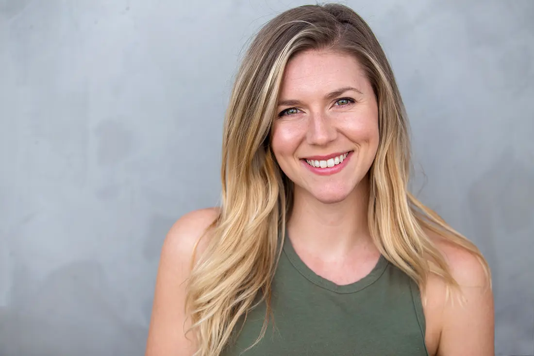 young blonde woman smiling