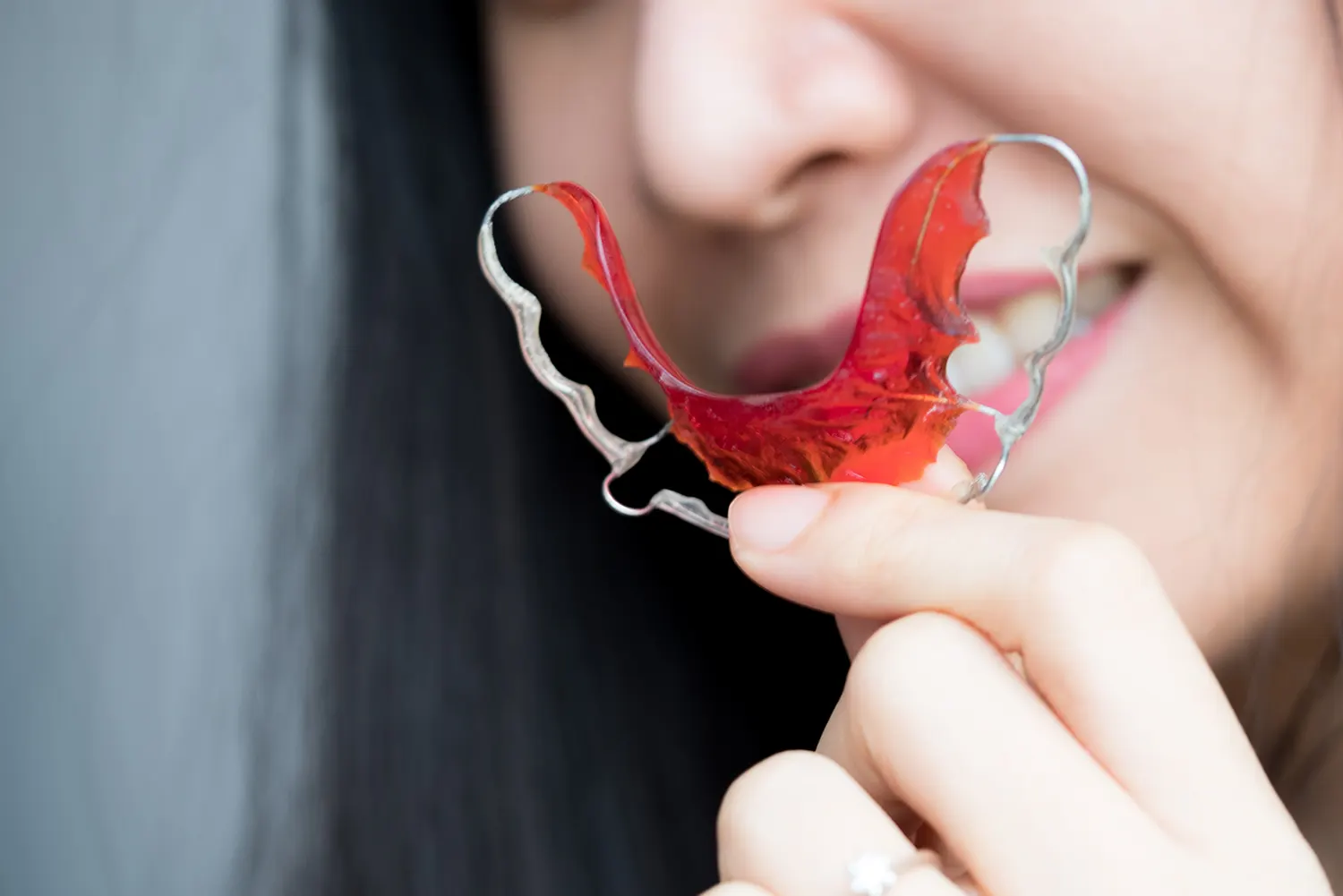 person holding retainer