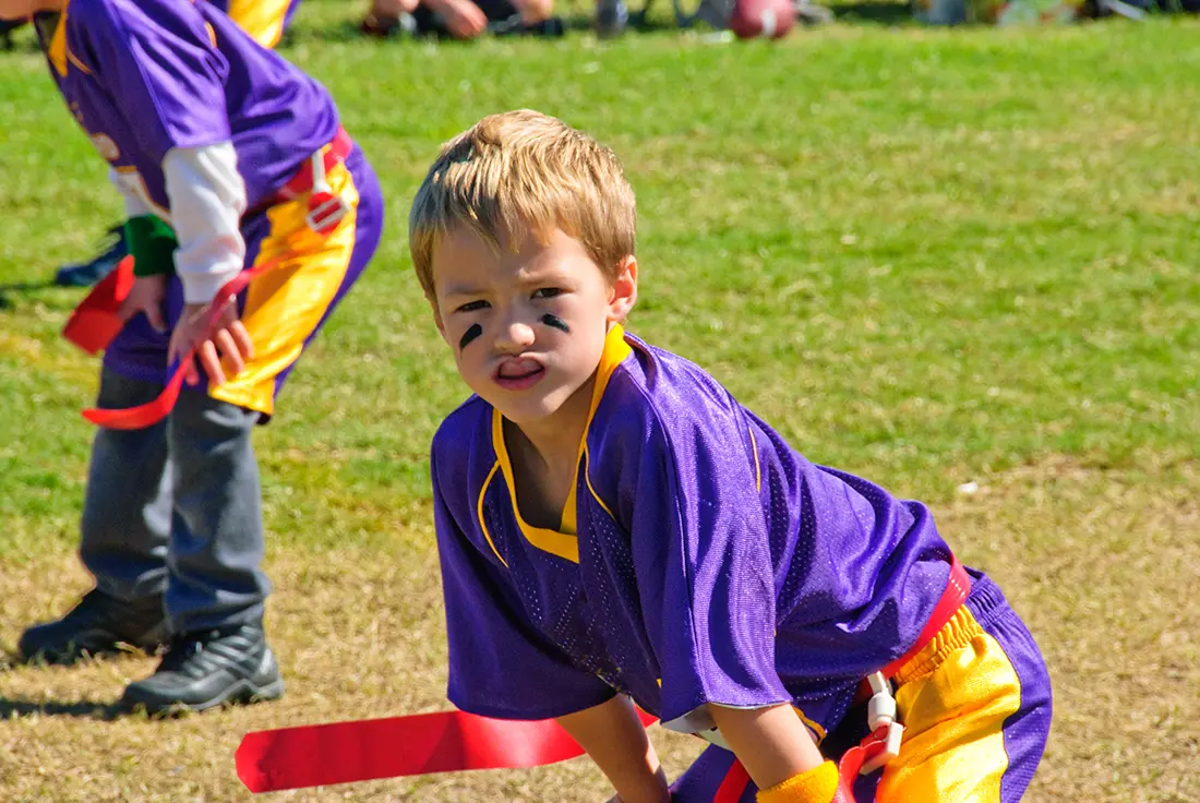 kid at sports game